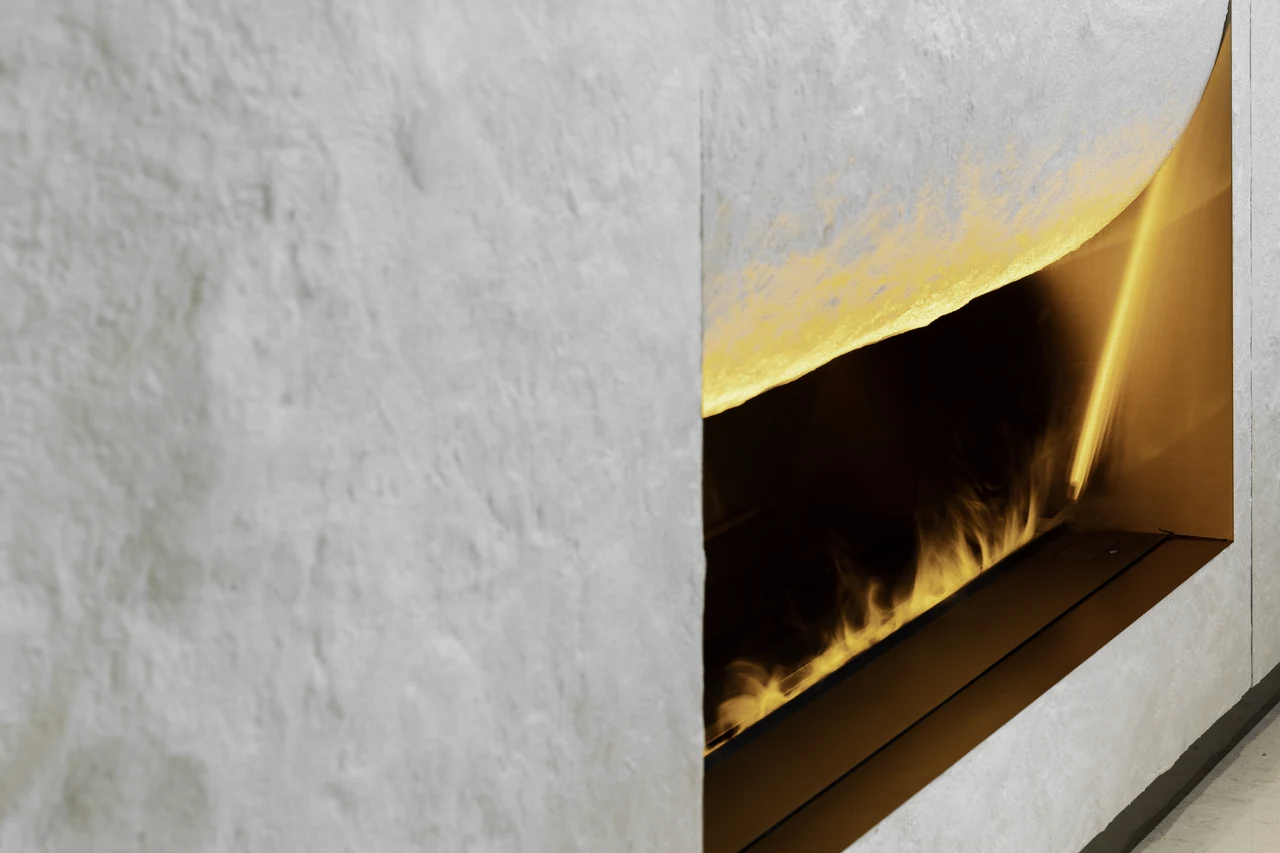 Banyan Tree Residence: textured stone meeting a brass recess