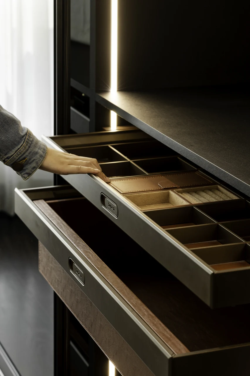 Open fitted drawers show the internal workmanship rather than only finished surfaces.